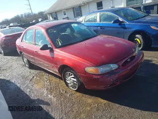 1999 Ford Escort SE with VIN 1FAFP13P6XW180845, listed as a IAAI auction lot 41398242 with 59,300 mi miles. Bid and sale history available at carsss.com. Image 1.
