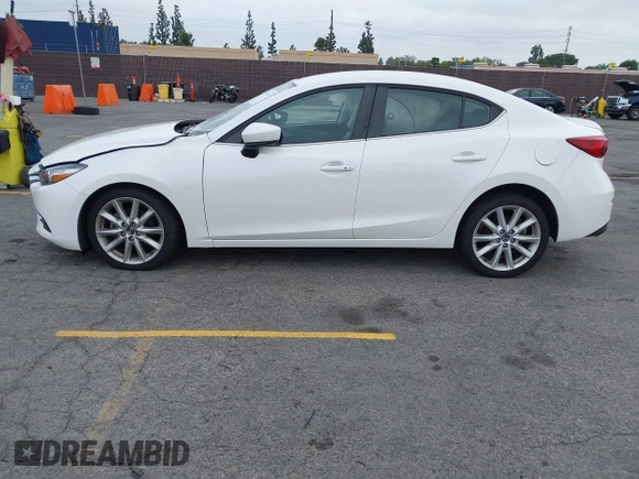 2017 Mazda 3 Touring with VIN 3MZBN1V72HM121902, listed as a IAAI auction lot 39193644 with 40,113 mi miles and . Bid and sale history available at DreamBid. Image 13.