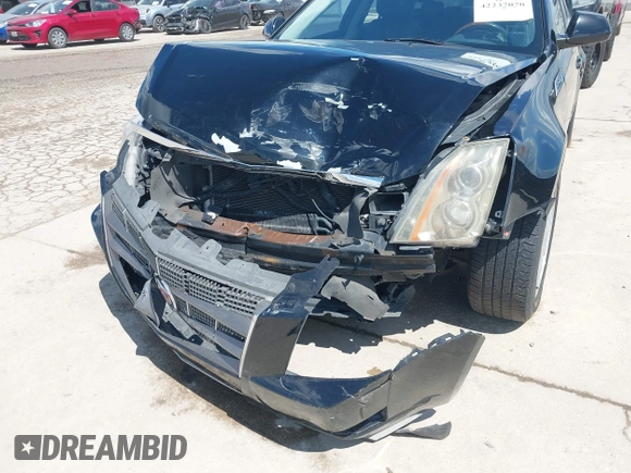 2008 Cadillac CTS RWD z VIN 1G6DJ577080174096, wystawiony jako IAAI lot #42237070 z przebiegiem 139 776 mil mil oraz . Historia ofert i sprzedaży dostępna na DreamBid. Obrazek 6.