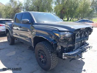 2024 Toyota Tacoma 4WD SR5 with VIN 3TMLB5JN4RM039036, listed as a IAAI auction lot 41813562 with 2,112 mi miles. Bid and sale history available at carsss.com. Image 1.