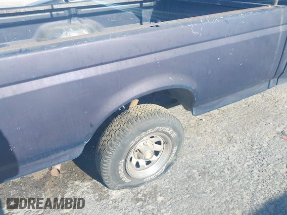 1989 Ford F-150 z VIN 1FTEF15YXKPA91958, wystawiony jako IAAI lot #42390477 z przebiegiem 21 554 mil mil oraz . Historia ofert i sprzedaży dostępna na DreamBid. Obrazek 6.