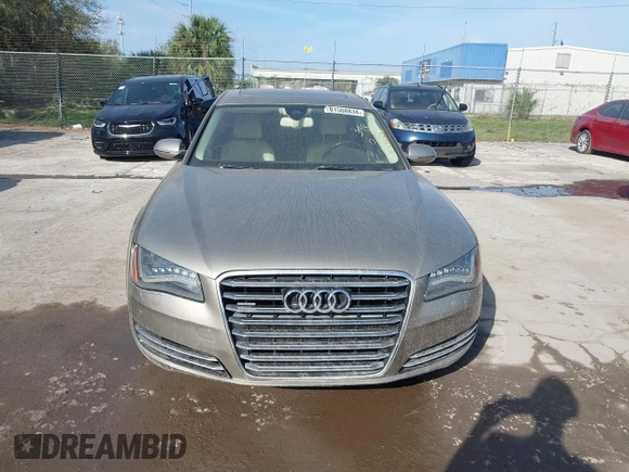 2012 Audi A8 z VIN WAURVAFD3CN024063, wystawiony jako IAAI lot #41706508 z przebiegiem Nie podano mil oraz . Historia ofert i sprzedaży dostępna na DreamBid. Obrazek 12.