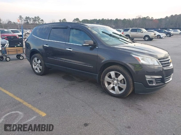 2015 Chevrolet Traverse LTZ with VIN 1GNKVJKDXFJ206159, listed as a IAAI auction lot 41762515 with 143,062 mi miles and . Bid and sale history available at DreamBid. Image 1.
