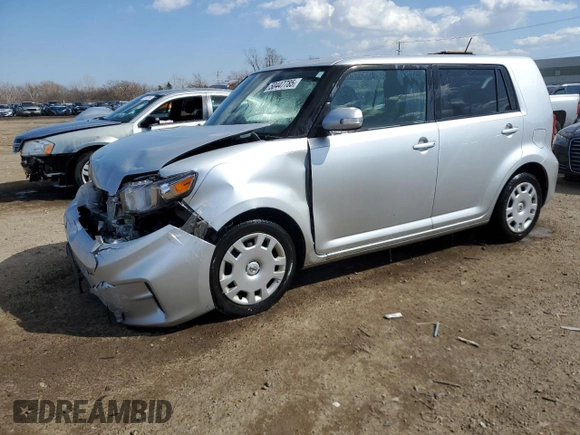 2012 Scion xB with VIN JTLZE4FE1CJ009084, listed as a Copart auction lot 50447785 with 74,155 mi miles and Salvage Title. Bid and sale history available at carsss.com. Image 1.