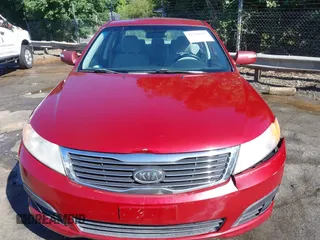 2009 Kia Optima LX z VIN KNAGE228395367017, wystawiony jako IAAI lot #42310556 z przebiegiem 234 760 mil mil oraz . Historia ofert i sprzedaży dostępna na DreamBid. Obrazek 12.