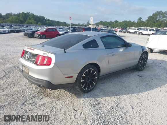 2012 Ford Mustang Premium with VIN 1ZVBP8AM7C5288124, listed as a IAAI auction lot 42280797 with 188,223 mi miles and . Bid and sale history available at DreamBid. Image 4.