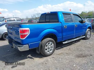 2014 Ford F-150 XL with VIN 1FTFW1CF4EKF14279, listed as a IAAI auction lot 42006454 with 104,648 mi miles. Bid and sale history available at carsss.com. Image 4.