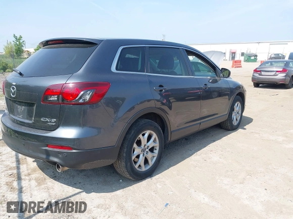 2014 Mazda CX-9 Touring z VIN JM3TB3CA4E0431520, wystawiony jako IAAI lot #42514932 z przebiegiem 119 837 mil mil oraz . Historia ofert i sprzedaży dostępna na DreamBid. Obrazek 4.