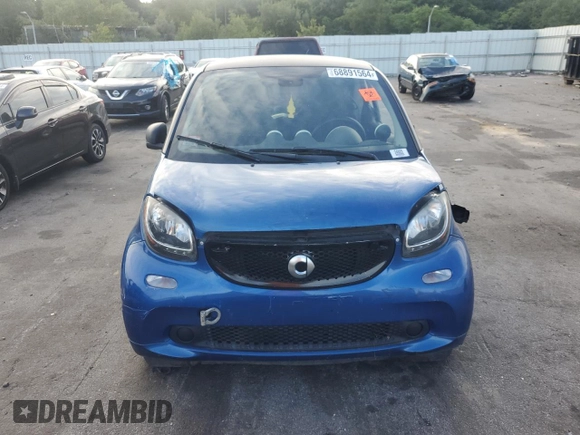 2016 Smart fortwo Passion z VIN WMEFJ5DA0GK076339, wystawiony jako Copart lot #68891564 z przebiegiem Nie podano mil oraz Szkoda całkowita • Salvage title. Historia ofert i sprzedaży dostępna na DreamBid. Obrazek 5.