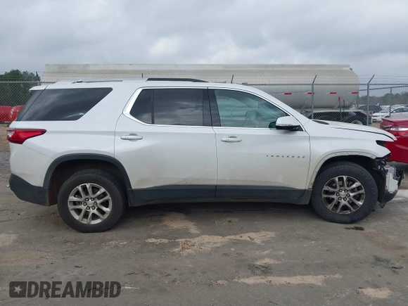 2018 Chevrolet Traverse LT Cloth z VIN 1GNERGKW8JJ279285, wystawiony jako IAAI lot #41795111 z przebiegiem 261 975 mil mil oraz . Historia ofert i sprzedaży dostępna na DreamBid. Obrazek 13.