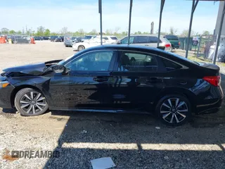 2023 Honda Civic EX with VIN 2HGFE1F73PH320247, listed as a IAAI auction lot 42148175 with 40,454 mi miles and . Bid and sale history available at DreamBid. Image 14.