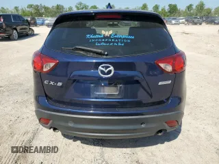 2013 Mazda CX-5 Grand Touring with VIN JM3KE2DE4D0147902, listed as a Copart auction lot 52696685 with 331,168 mi miles and Clean Title. Bid and sale history available at carsss.com. Image 6.