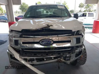 2019 Ford F-150 XL with VIN 1FTEW1E55KFB69767, listed as a IAAI auction lot 42326370 with 143,523 mi miles and . Bid and sale history available at DreamBid. Image 12.
