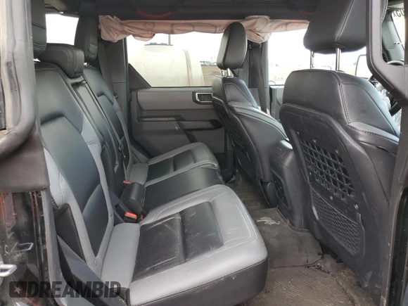 2024 Ford Bronco Big Bend z VIN 1FMDE7BH5RLA10657, wystawiony jako Copart lot #56905105 z przebiegiem 32 537 mil mil oraz Szkoda całkowita • Salvage title. Historia ofert i sprzedaży dostępna na DreamBid. Obrazek 11.