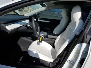 2021 Tesla Model 3 Standard Range Plus with VIN 5YJ3E1EA0MF072457, listed as a Copart auction lot 51666135 with 32,534 mi miles and Salvage Title. Bid and sale history available at carsss.com. Image 7.