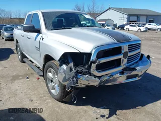 2018 Ram 1500 Big Horn z VIN 1C6RR7GG6JS310482, wystawiony jako IAAI lot #41779744 z przebiegiem 74 548 mil mil oraz . Historia ofert i sprzedaży dostępna na DreamBid. Obrazek 1.