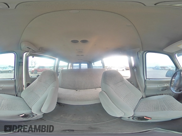 2001 Ford Econoline Passenger XL with VIN 1FBSS31L41HB19352, listed as a Copart auction lot 53101325 with 101,807 mi miles and Salvage title. Bid and sale history available at DreamBid. Image 13.