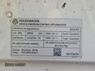 2024 Volkswagen Tiguan SE z VIN 3VV3B7AX3RM105123, wystawiony jako IAAI lot #42796460 z przebiegiem 36 543 mil mil oraz . Historia ofert i sprzedaży dostępna na DreamBid. Obrazek 18.