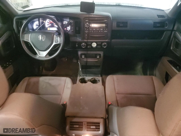 2010 Honda Ridgeline RTL with VIN 5FPYK1F57AB502049, listed as a Copart auction lot 87058684 with 228,156 mi miles and Clean Title. Bid and sale history available at carsss.com. Image 8.