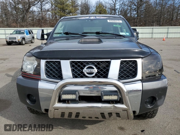 2007 Nissan Titan LE with VIN 1N6AA07B77N219993, listed as a Copart auction lot 44948415 with 170,422 mi miles and Salvage title. Bid and sale history available at DreamBid. Image 5.