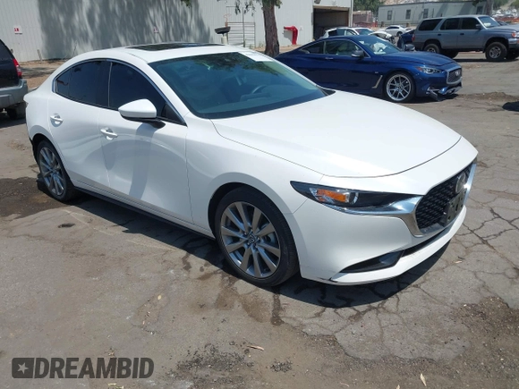 2023 Mazda 3 S Carbon Edition with VIN 3MZBPACM1PM356552, listed as a IAAI auction lot 42603574 with 20,092 mi miles and . Bid and sale history available at DreamBid. Image 1.