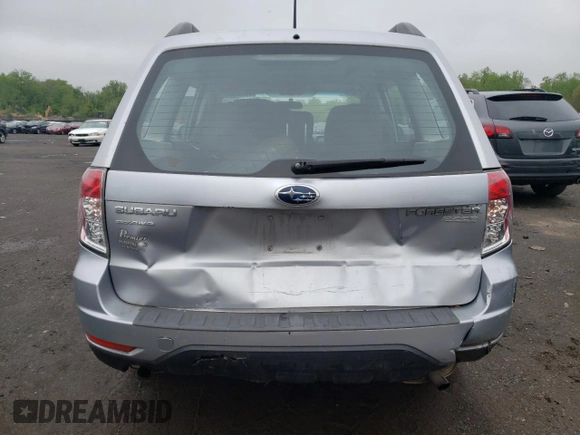 2012 Subaru Forester X with VIN JF2SHABCXCH466217, listed as a Copart auction lot 56293985 with 151,046 mi miles and Salvage Title. Bid and sale history available at DreamBid. Image 6.