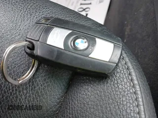 2011 BMW 3 Series 328i xDrive with VIN WBAPK7C55BA772321, listed as a IAAI auction lot 41873123 with 95,500 mi miles. Bid and sale history available at carsss.com. Image 11.