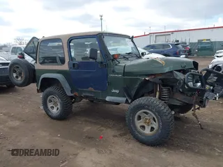 1997 Jeep Wrangler SE with VIN 1J4FY29PXVP406939, listed as a IAAI auction lot 41612380 with 248,314 mi miles. Bid and sale history available at carsss.com. Image 13.