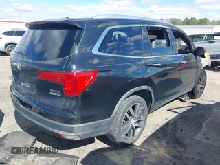 2016 Honda Pilot Elite with VIN 5FNYF6H0XGB127133, listed as a IAAI auction lot 41723875 with Not Provided miles. Bid and sale history available at carsss.com. Image 4.