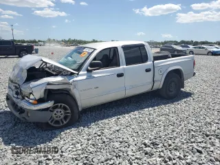2002 Dodge Dakota SLT z VIN 1B7HL48N32S558742, wystawiony jako Copart lot #55474825 z przebiegiem Nie podano mil oraz Szkoda całkowita • Salvage title. Historia ofert i sprzedaży dostępna na DreamBid. Obrazek 1.