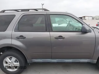 2010 Ford Escape XLT с VIN 1FMCU9D78AKB95229, выставлен на аукционе IAAI как лот 42366349 с пробегом 152 077 миль миль и . История ставок и продаж доступна на DreamBid. Изображение 13.