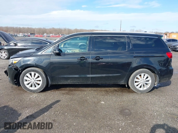 2017 Kia Sedona EX with VIN KNDMC5C18H6260441, listed as a IAAI auction lot 41797159 with 77,309 mi miles. Bid and sale history available at carsss.com. Image 14.