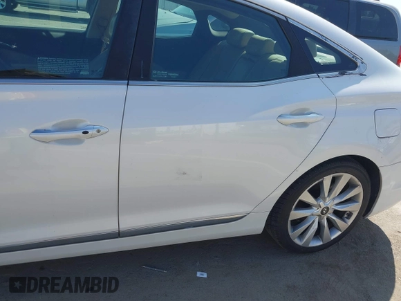 2013 Hyundai Azera with VIN KMHFH4JG0DA329329, listed as a IAAI auction lot 42539047 with 105,434 mi miles and . Bid and sale history available at DreamBid. Image 12.