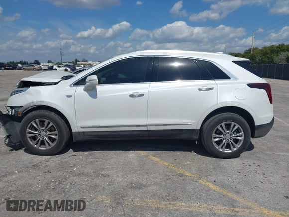 2020 Cadillac XT5 Premium Luxury FWD with VIN 1GYKNCRS7LZ129119, listed as a IAAI auction lot 41710878 with 52,575 mi miles and . Bid and sale history available at carsss.com. Image 14.