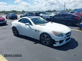 2015 Mercedes-Benz SLK 350 z VIN WDDPK5HAXFF106891, wystawiony jako IAAI lot #42545401 z przebiegiem 107 898 mil mil oraz . Historia ofert i sprzedaży dostępna na DreamBid. Obrazek 1.