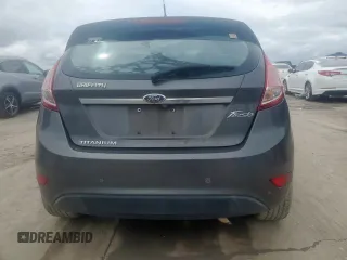 2015 Ford Fiesta Titanium z VIN 3FADP4FJ5FM203174, wystawiony jako Copart lot #60727515 z przebiegiem 91 898 mil mil oraz Czysty tytuł • Clean title. Historia ofert i sprzedaży dostępna na DreamBid. Obrazek 6.