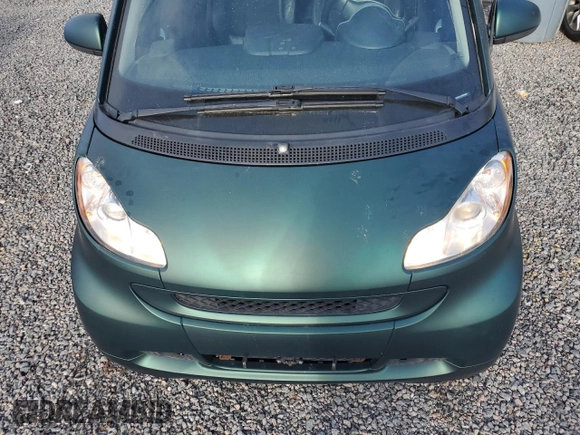 2009 Smart fortwo Passion z VIN WMEEK31X89K289001, wystawiony jako Copart lot #51781925 z przebiegiem 79 742 mil mil oraz Szkoda całkowita • Salvage title. Historia ofert i sprzedaży dostępna na DreamBid. Obrazek 12.