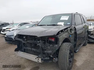 2020 Toyota 4Runner SR5 with VIN JTEBU5JR2L5779671, listed as a IAAI auction lot 41572359 with 87,458 mi miles. Bid and sale history available at carsss.com. Image 6.
