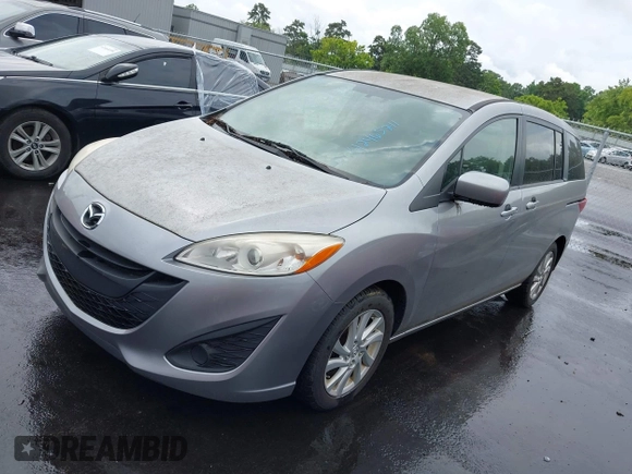 2012 Mazda 5 Sport z VIN JM1CW2BL6C0105662, wystawiony jako IAAI lot #42465711 z przebiegiem 67 534 mil mil oraz . Historia ofert i sprzedaży dostępna na DreamBid. Obrazek 2.