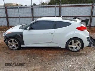 2013 Hyundai Veloster Turbo z VIN KMHTC6AE2DU128607, wystawiony jako IAAI lot #41788836 z przebiegiem 115 500 mil mil oraz . Historia ofert i sprzedaży dostępna na DreamBid. Obrazek 15.