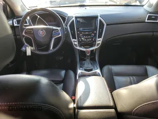2014 Cadillac SRX Premium Collection z VIN 3GYFNGE38ES577313, wystawiony jako Copart lot #87679045 z przebiegiem 92 070 mil mil oraz Szkoda całkowita • Salvage title. Historia ofert i sprzedaży dostępna na DreamBid. Obrazek 8.