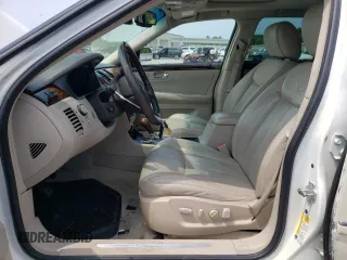 2009 Cadillac DTS 1SC z VIN 1G6KD57Y99U141826, wystawiony jako Copart lot #56242094 z przebiegiem 107 960 mil mil oraz Szkoda całkowita • Salvage title. Historia ofert i sprzedaży dostępna na DreamBid. Obrazek 7.