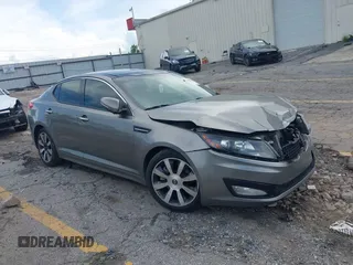 2013 Kia Optima SX with VIN 5XXGR4A64DG128017, listed as a IAAI auction lot 42486464 with 126,350 mi miles and . Bid and sale history available at DreamBid. Image 1.