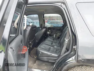 2009 Cadillac Escalade z VIN 1GYFK13269R147563, wystawiony jako IAAI lot #41462689 z przebiegiem 210 095 mil mil oraz . Historia ofert i sprzedaży dostępna na DreamBid. Obrazek 8.