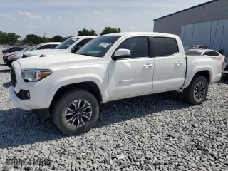 2020 Toyota Tacoma 4WD SR5 with VIN 3TYCZ5AN2LT006401, listed as a Copart auction lot 53909335 with 164,713 mi miles and Non Repairable. Bid and sale history available at carsss.com. Image 1.