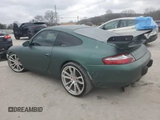 1999 Porsche 911 z VIN WP0AA299XXS623462, wystawiony jako Copart lot #85549554 z przebiegiem Nie podano mil oraz Szkoda całkowita • Salvage title. Historia ofert i sprzedaży dostępna na DreamBid. Obrazek 2.