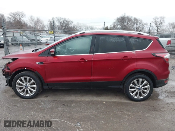 2017 Ford Escape Titanium with VIN 1FMCU9J95HUA48807, listed as a IAAI auction lot 41522636 with 218,342 mi miles. Bid and sale history available at carsss.com. Image 14.