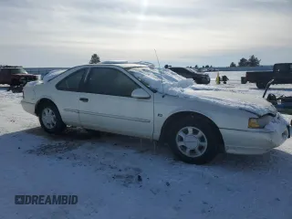 1995 Ford Thunderbird LX with VIN 1FALP62W4SH197312, listed as a Copart auction lot 44723355 with 175,537 mi miles and Salvage Title. Bid and sale history available at DreamBid. Image 4.