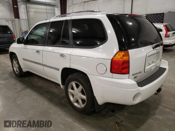 2009 GMC Envoy SLT with VIN 1GKDT43S492124405, listed as a Copart auction lot 81337354 with 154,045 mi miles and Salvage Title. Bid and sale history available at carsss.com. Image 2.