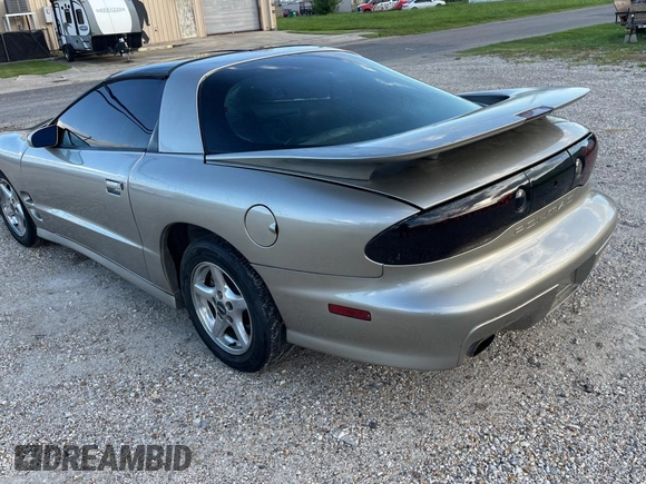 1999 Pontiac Firebird Formula with VIN 2G2FV22G1X2205745, listed as a Copart auction lot 65841425 with 142,913 mi miles and Clean title. Bid and sale history available at DreamBid. Image 3.